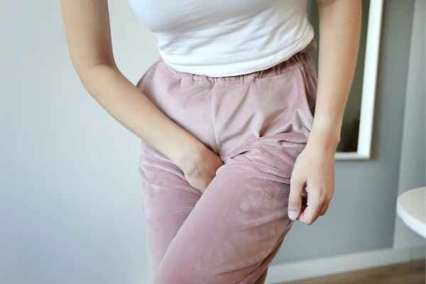 woman struggling with urine incontinence Kingston Vale